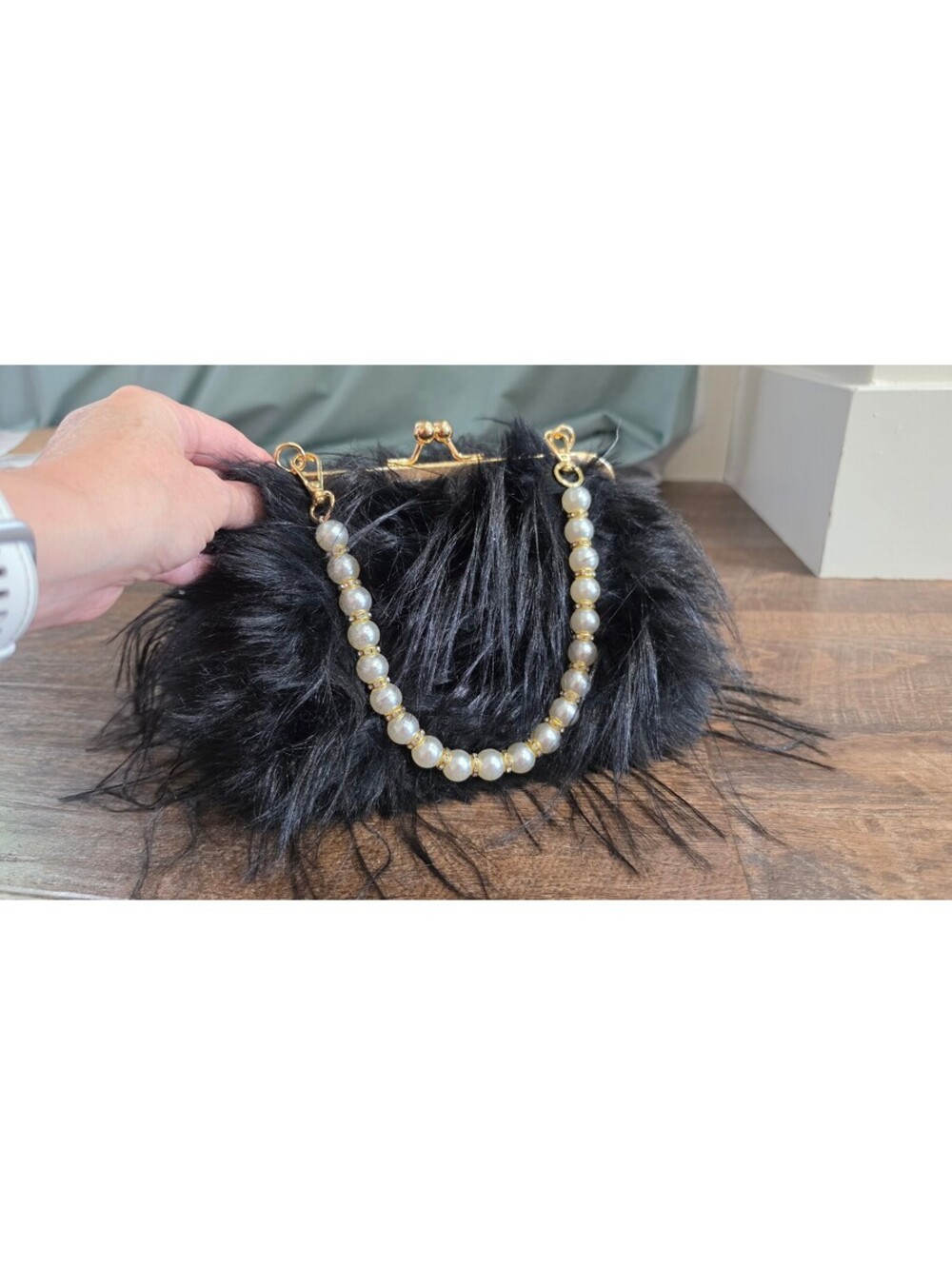 Elegant Black Faux Fur Clutch Bag with Pearl Handle and Gold Frame